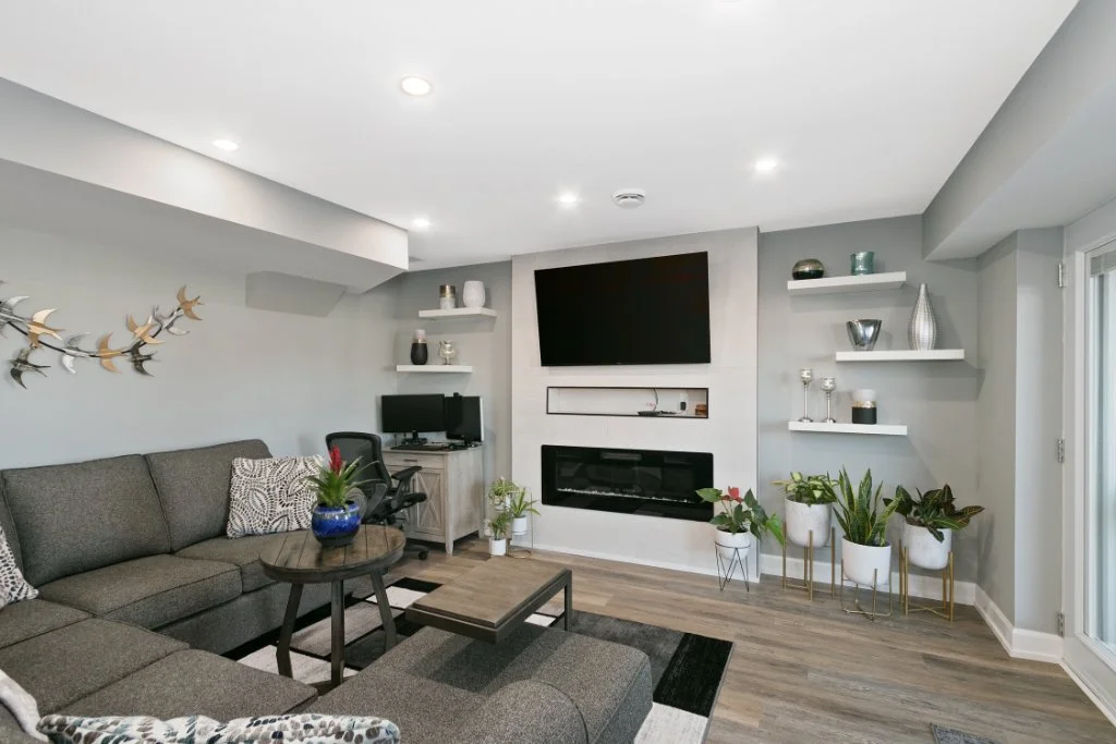 Basement living room with fireplace