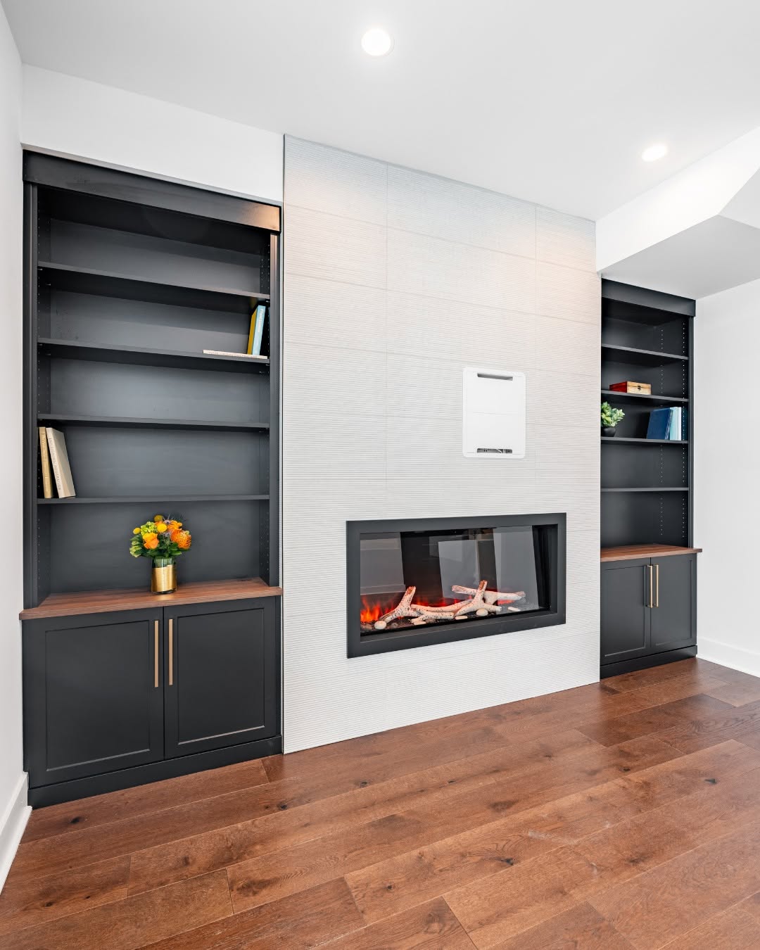 Custom fireplace with built-in bookshelves