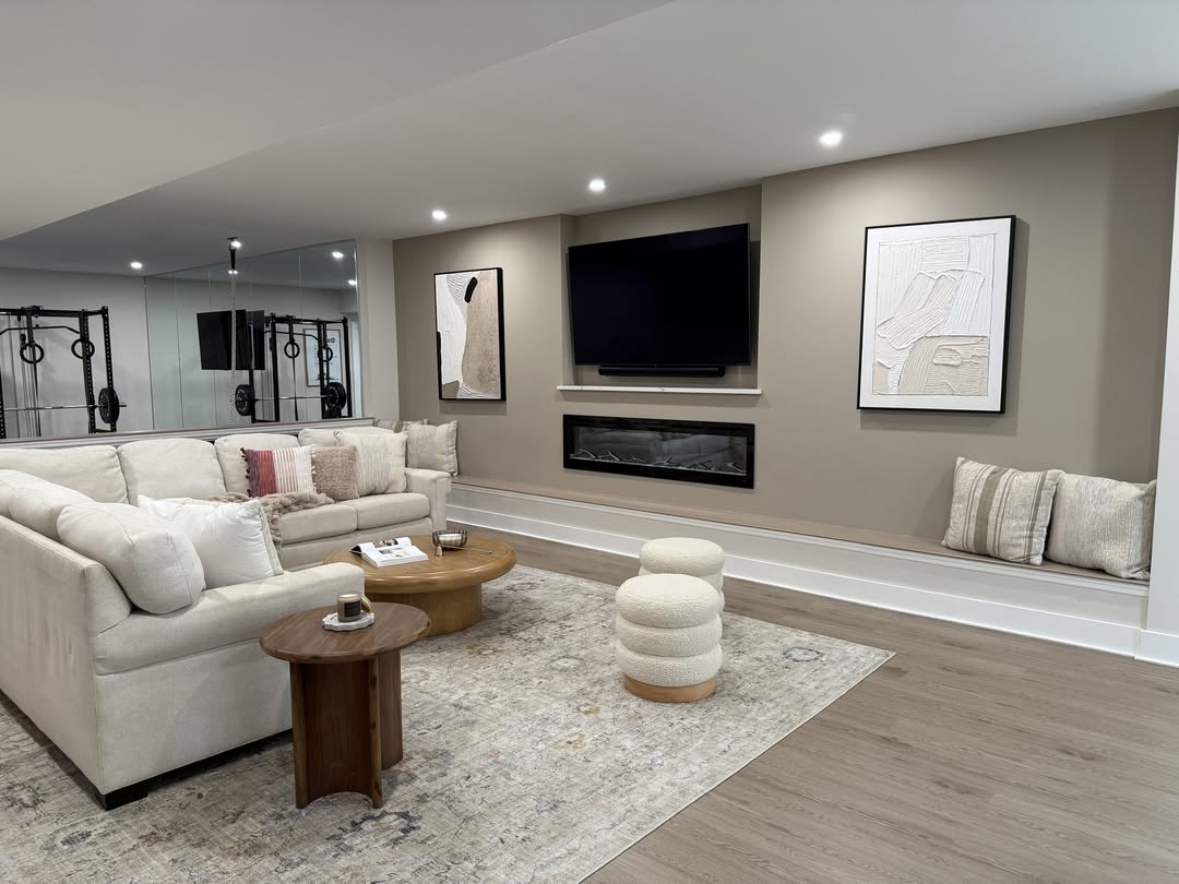 Basement living room with linear fireplace